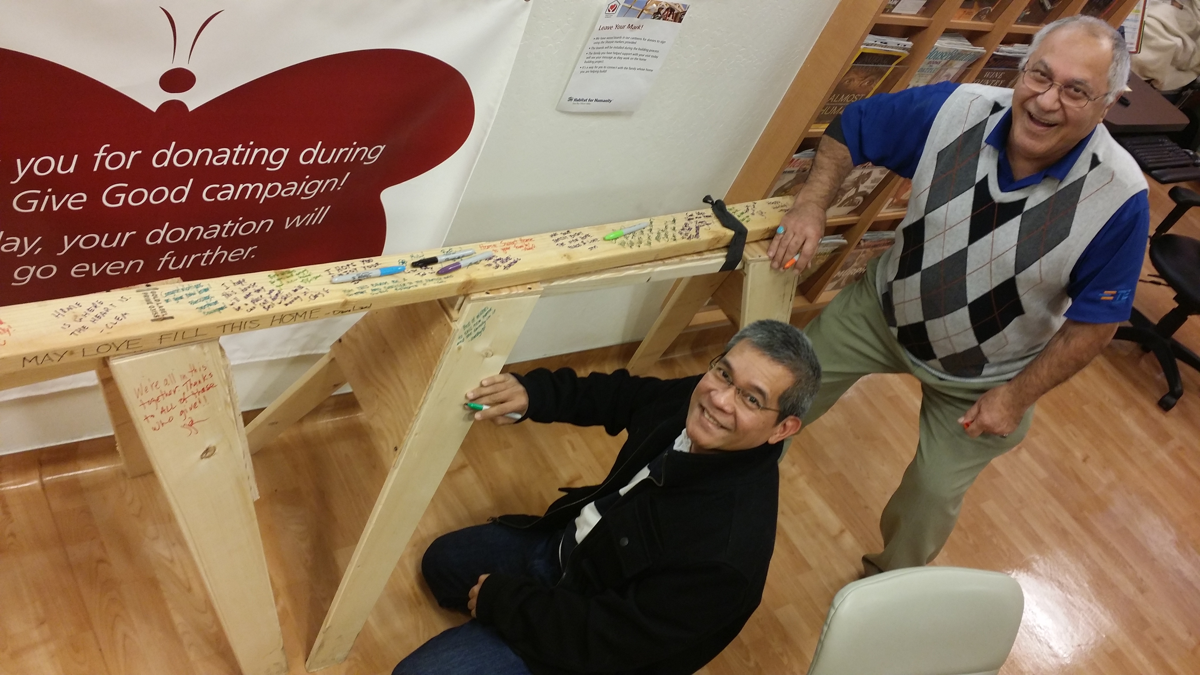 Donors signing boards