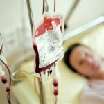 Woman receiving transfusion