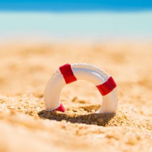 Summer-miniature-lifebuoy-in-sand