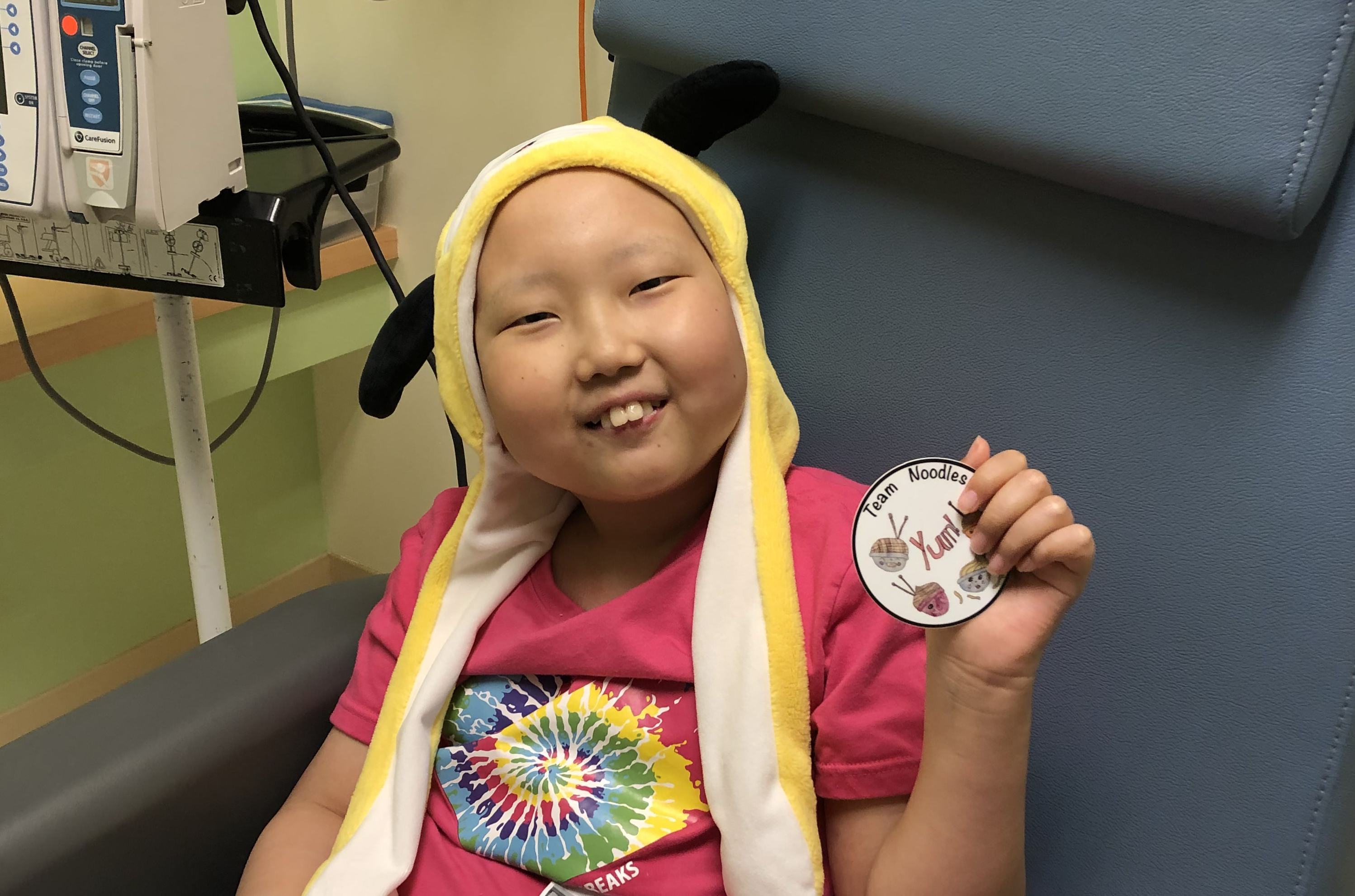 Zoe with yellow hat at hospital