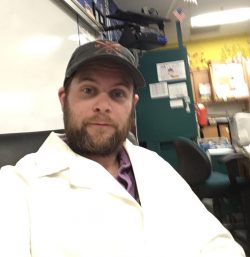 thomas maloney sitting in classroom